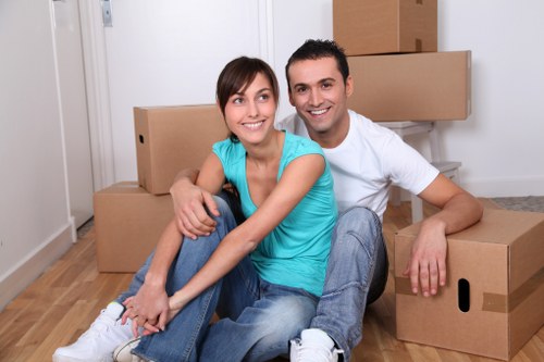 House movers loading furniture in Park Royal near residential flats