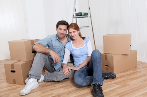 Local removals crew handling furniture in Park Royal